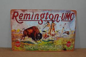 lot 63 image: Novelty Metal Sign - Remington