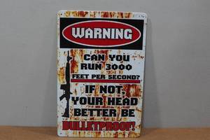 lot 66 image: Novelty Metal Sign - Warning Can You Run