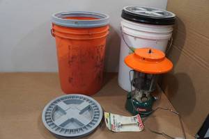 lot 211 image: Coleman Lantern with 5-Gallon Bucket Case and Accessories