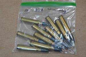lot 361 image: 10 Loose .338 Win Mag SP Ammo