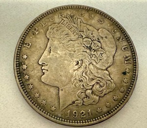 lot 17 image: 1921-D Morgan Silver Dollar
