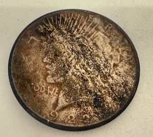 lot 33 image: 1922 Peace Silver Dollar Coin - Heavily Toned