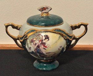 lot 58 image: Beauties of the Red Mansion Heirloom Porcelain Teapot Music Box by Ardleigh Elliott