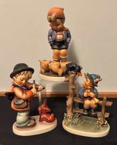 lot 82 image: Set of 3 Goebel Hummel Figurines Including Farm Boy, Puppy Love and Mischief Maker