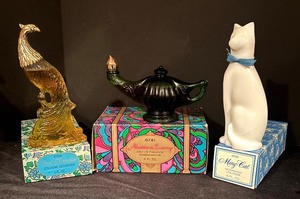 lot 203 image: Avon Ming Cat Moonwind Cologne, Alladins Lamp Birds of Paradise Foaming Bath Oil and Bird of Paradise Cologne Decanter