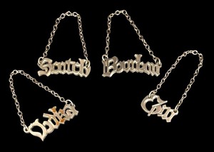 lot 274 image: Set of 4 Vintage Metal Decanter Labels including Scotch, Bourbon, Gin and Vodka