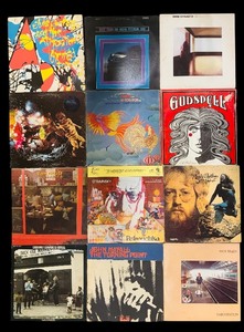 lot 131 image: BR1 - Collection of 12 Vintage Vinyl Records including Paul Brady, Dire Straits, and More
