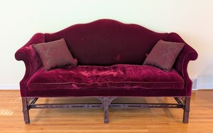 lot 10 image: LR - Vintage Burgundy Velvet Sofa with Carved Wood Base and 2 Patterned Pillows