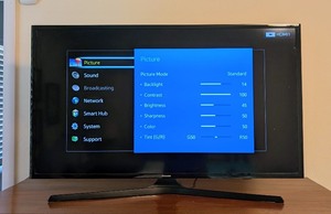 lot 52 image: MB - Samsung 40-Inch LED TV Model UN40J5200AF with Stand