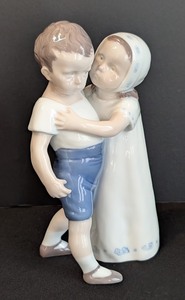 lot 58 image: LR - Bing & Grndahl Copenhagen Porcelain Figurine of Boy and Girl Hugging