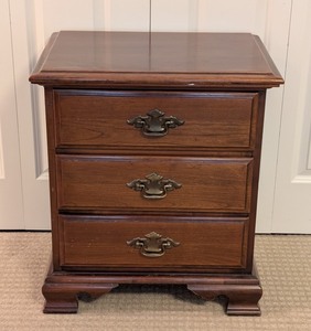 lot 60 image: MB - Vintage Cherry House 3-Drawer Wooden Nightstand with Brass Handles