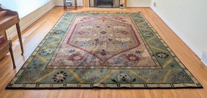 lot 64 image: LR - Pottery Barn Amrita Area Rug with Geometric Floral Pattern