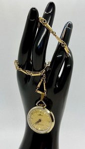 lot 35 image: Harvester Pocket Watch with 24 Inch Gold Tone Chain