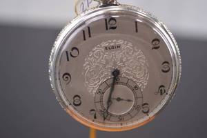lot 32 image: Vintage Elgin 14k gold filled Streamline Pocket Watch with Display Dome and Stand