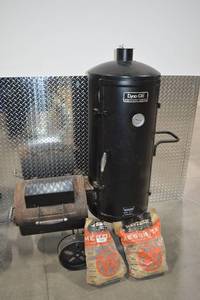 lot 204 image: Dyna-Glo Signature Series Vertical Smoker with Mesquite Wood Chunks