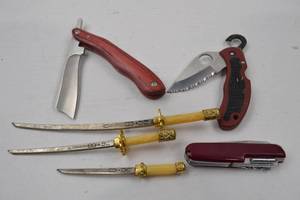 lot 50 image: Hand Tool Lot - Folding Knives and Miniature Display Swords Assortment