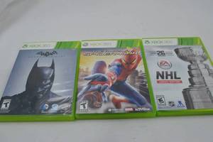 lot 58 image: Xbox 360 Games Batman Arkham Origins, Amazing Spider-Man, NHL Legacy Edition