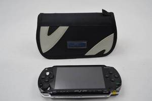 lot 61 image: Sony PSP PlayStation Portable Console with Case, Missing Power Cord