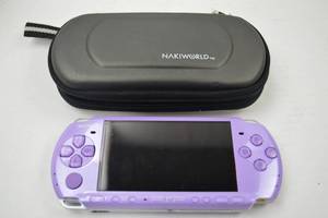 lot 62 image: Sony PSP Purple Handheld Console with NakiWorld Case