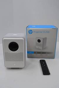 lot 65 image: HP Projector CC200 1080p LED, Remote, No Power Cord