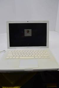 lot 97 image: Apple MacBook A1181 13-Inch White (2007) Laptop - Password Locked