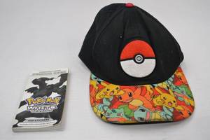 lot 122 image: Pokemon White Version Sticker Book and Pokemon Cap - 450 Stickers
