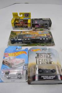 lot 123 image: Hot Wheels Justice League Batmobile & 57 Chevy, M2 Machines 1957 Bel Airs, Big Rig Lot