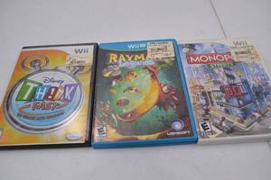 lot 165 image: Nintendo Wii and Wii U Video Game Bundle Monopoly Streets, Rayman Legends, Think Fast