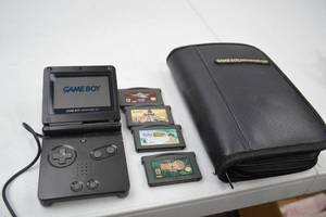lot 190 image: Game Boy Advance SP Console with Charger, Case, and 4 GBA Games