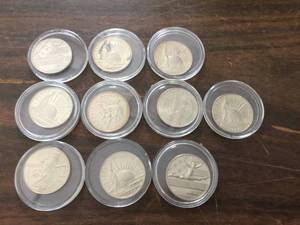 lot 127 image: 10 Commemorative U.S. Half Dollars