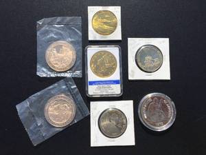 lot 134 image: (7) U.S. Commemorative CoinsRounds Including 1849 Replica