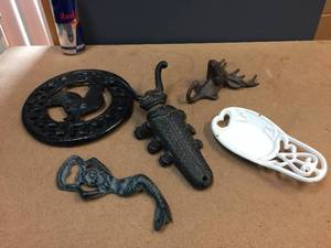 lot 218 image: Group Cast Iron - Boot Jack - Trivet - Soap Dish - Hook