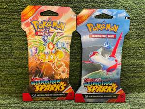 lot 61 image: 2024 Surging Sparks Sleeved Booster Packs (Two Packs)
