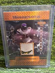 lot 191 image: 2013 Tri-City Sport Glass Breakers Game Used Patch Relic 50 Adrian Peterson