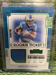 lot 167 image: 2021 Contenders Rookie Ticket Amon-Ra St. Brown Green Foil Jersey