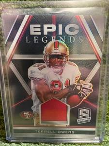 lot 168 image: 2024 Spectra Epic Legends Terrell Owens Jersey Relic 99