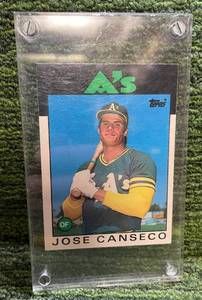 lot 172 image: 1986 Topps Traded Jose Canseco Baseball Rookie Card #201