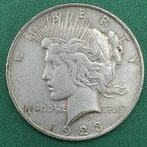 lot 15 image: 1923 Peace Silver Dollar - 90% Silver