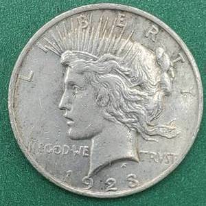 lot 16 image: 1923 Peace Silver Dollar - 90% Silver