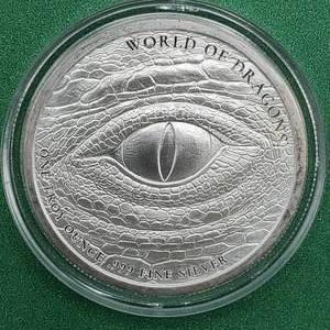 lot 24 image: World of Dragons Welsh Low Mintage-999 Silver 1 Oz Ounce Art Bar Round Coin in Airtite