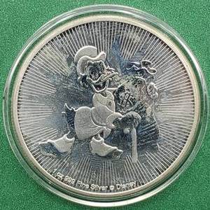 lot 26 image: 2018 NIUE UK Queen Elizabeth II Uncle Scrooge Silver $2, 1 toz .999 Silver, in Airtite