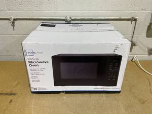 lot 64 image: Mainstays 1.1 Cu. ft Microwave Oven #MS8436193153-03