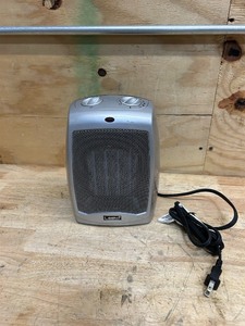 lot 159 image: Lasko 9 1500W Electric Ceramic Space Heater with Adjustable Thermostat, Silver, 754200