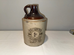 lot 6 image: Antique Hugh Berry Tonic Stoneware Jug by E.A. Fargo & Co.