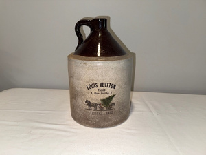 lot 14 image: Antique Stoneware Jug with Louis Vuitton Branding, Unique Decor Piece