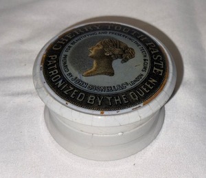 lot 32 image: Antique English Advertising Ironstone Cherry Tooth Paste Pot with Lid - Patronized by the Queen
