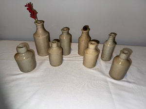 lot 53 image: Lot of 8 Antique English &nbspStoneware Bottles - Rustic Decor Collection