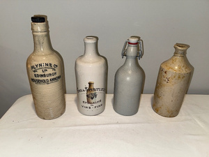 lot 59 image: Vintage Ironstone English Bottle Lot Including Plynine Co. Edinburgh Ammonia