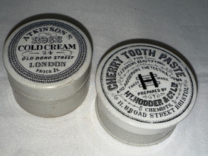 lot 93 image: Antique English Advertising Ironstone&nbspAtkinsons Cold Cream & H. Hodders Tooth Paste Pots