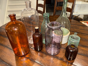 lot 170 image: Vintage Glass Bottle Collection - Amber, Clear, and More